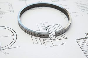 Кольцо с покрытием DuroGlide, содержащим частицы алмаза